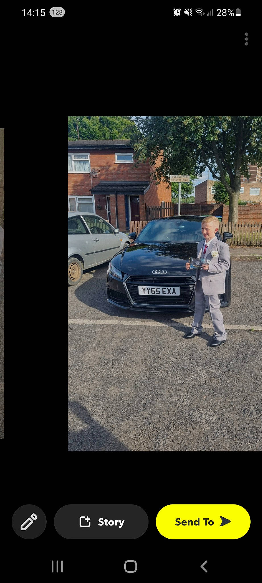 Henry is registered to the contest to win money with this photo: asphalt, automotive_design, automotive_exterior, automotive_fog_light, automotive_lighting, bumper, car, grille, headlamp, hood, joy, motor_vehicle, person, personal_luxury_car, road_surface, rolling, tire, vehicle, vehicle_door, vehicle_registration_plate