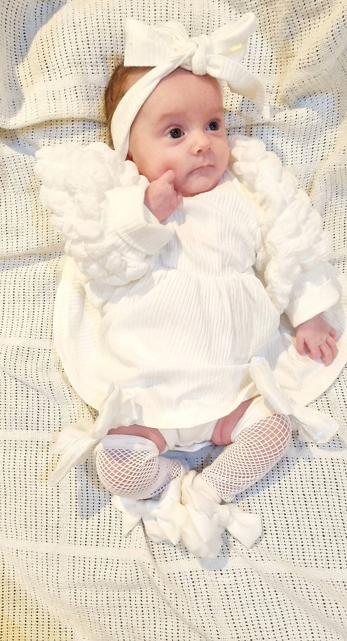 Dottie joined the competition — help win amazing prizes! baby, baby_products, baby_toddler_clothing, cheek, child, comfort, dress, face, hand, head, headgear, headwear, linens, lip, pattern, person, pink, sitting, skin, sleeve