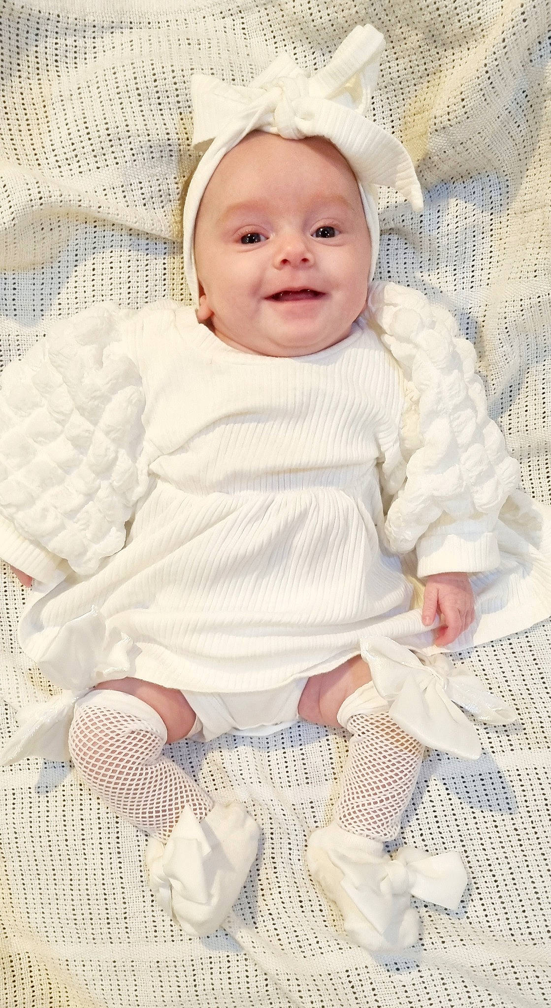Dottie is registered to the contest to win money with this photo: baby, baby_products, baby_safety, baby_toddler_clothing, cheek, child, comfort, happy, iris, linens, pattern, person, photograph, product, skin, sleeve, smile, textile, toddler, white