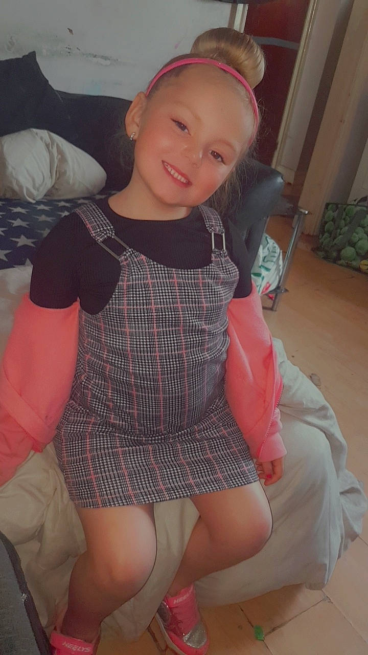 Summer-may is registered to the contest to win money with this photo: arm, day_dress, dress, face, hair, hand, head, human_body, joy, knee, lip, neck, one_piece_garment, person, pink, skin, sleeve, smile, thigh, trunk