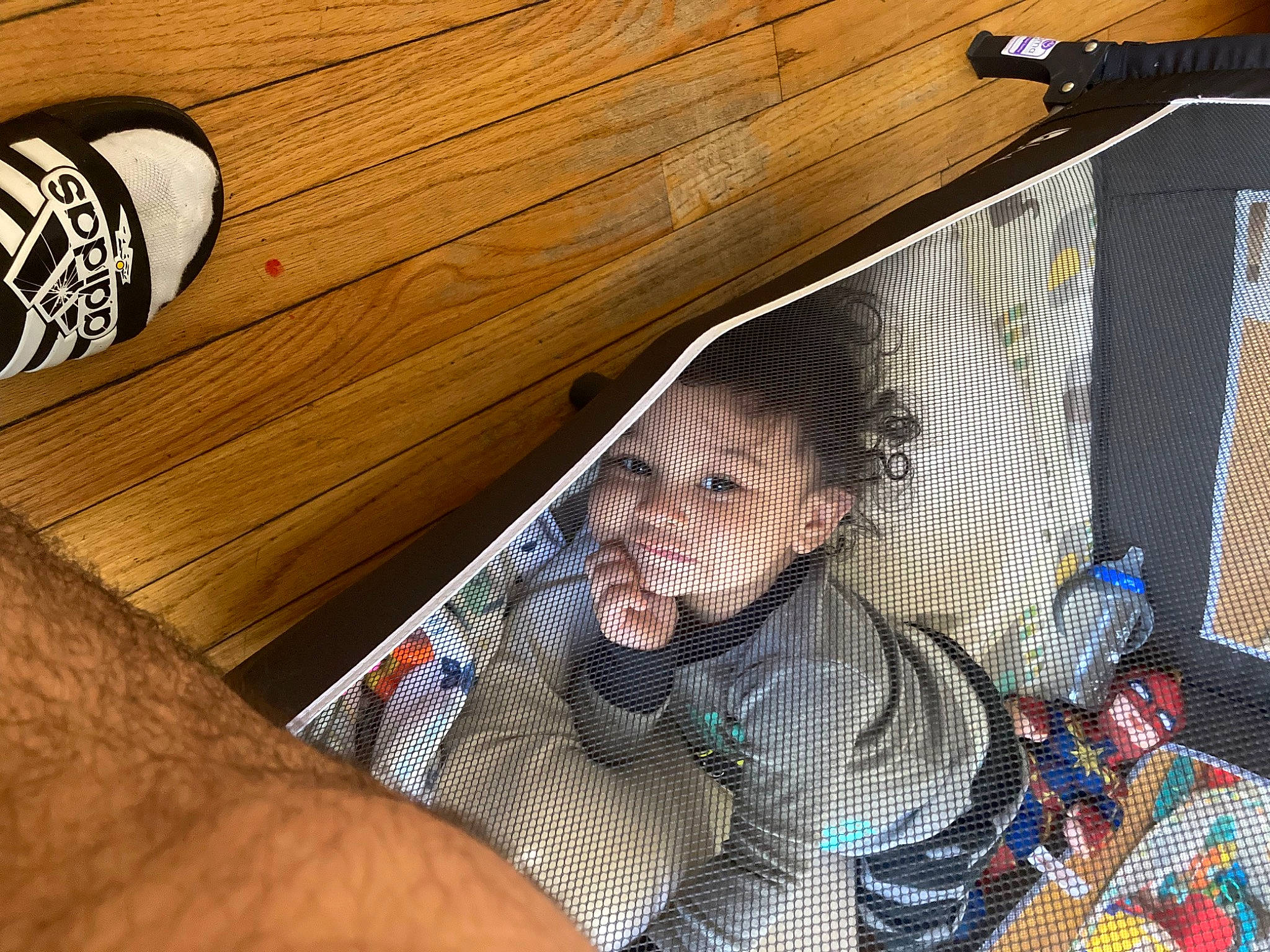 Leonel is registered to the contest to win money with this photo: baby_products, comfort, flooring, fun, hammock, hardwood, leisure, mesh, pattern, person, plank, plywood, recreation, room, sitting, sunglasses, toddler, varnish, wood, wood_flooring