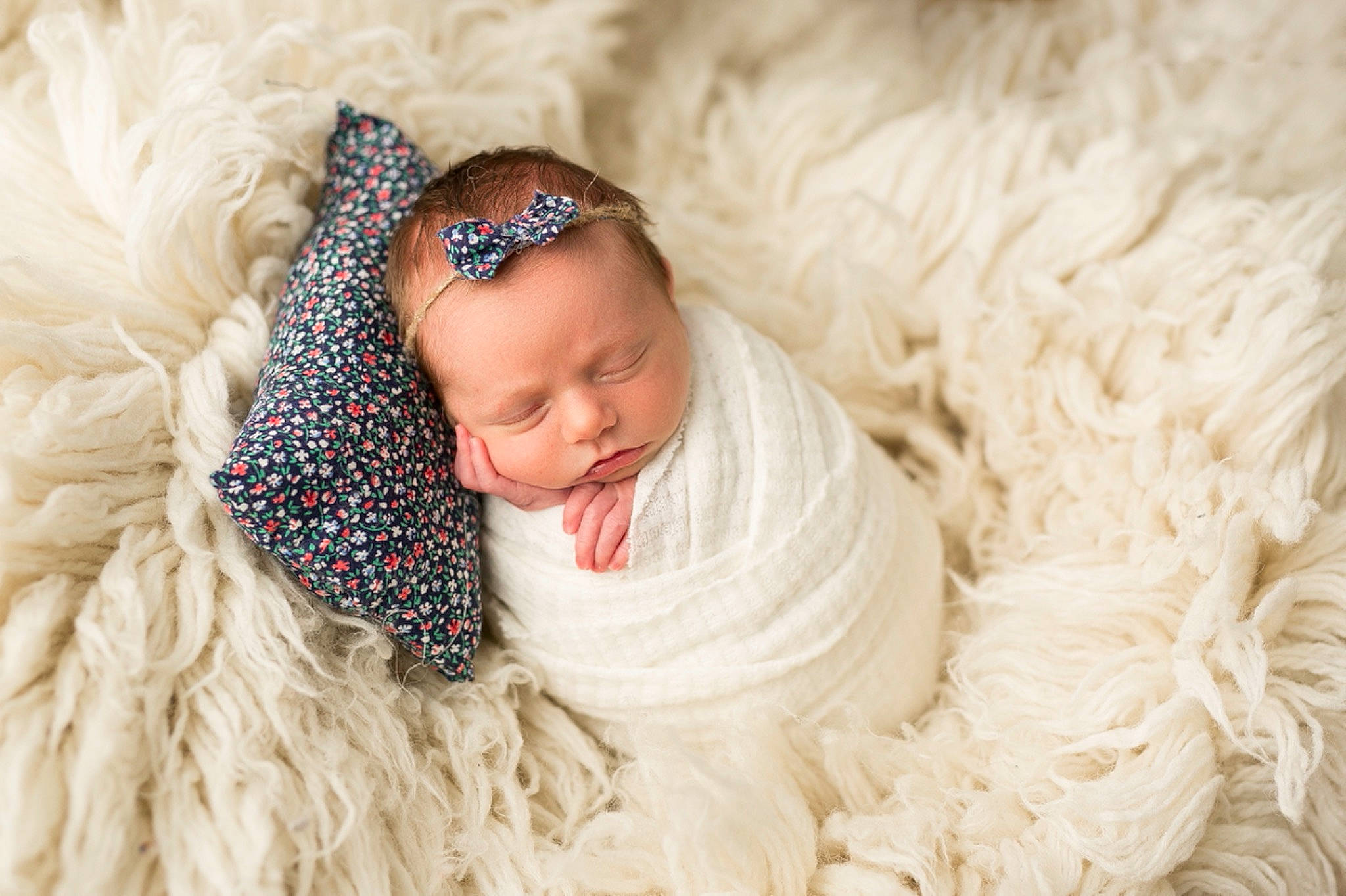 Sutton is registered to the contest to win money with this photo: baby, baby_sleeping, baby_toddler_clothing, carpet, child, comfort, crochet, facial_expression, fashion_accessory, flooring, fur, happy, headgear, linens, magenta, outerwear, pattern, person, portrait_photography, toddler