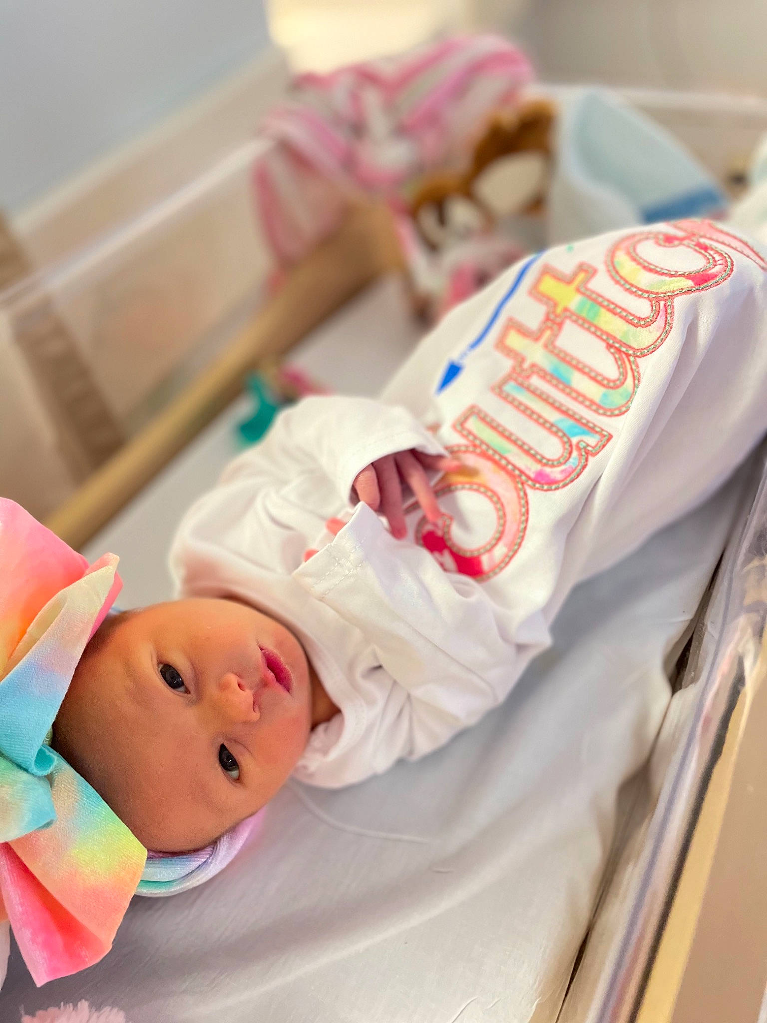 Sutton is registered to the contest to win money with this photo: baby, baby_products, baby_safety, baby_toddler_clothing, bedtime, birth, child, comfort, event, headwear, health_care, hospital, infant_bed, linens, medical, nap, person, room, service, sleep