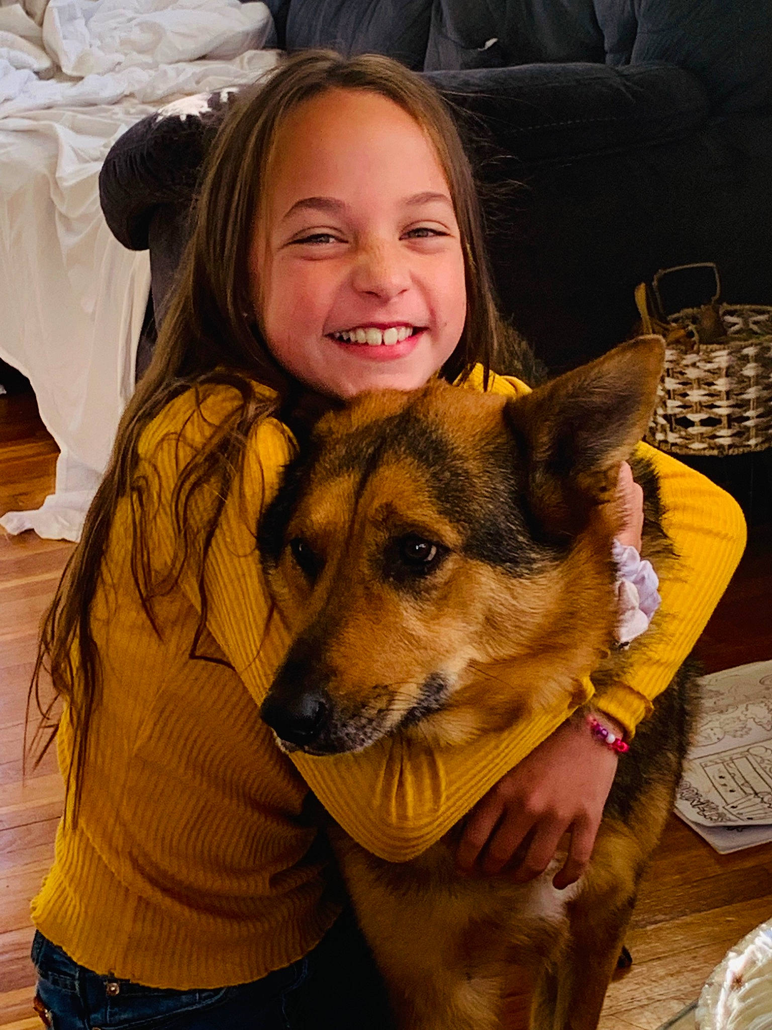 Bailee is registered to the contest to win money with this photo: canidae, carnivore, companion_dog, dog, dog_breed, ear, eye, facial_expression, fawn, fun, fur, happy, head, herding_dog, joy, person, plant, sitting, smile, snout