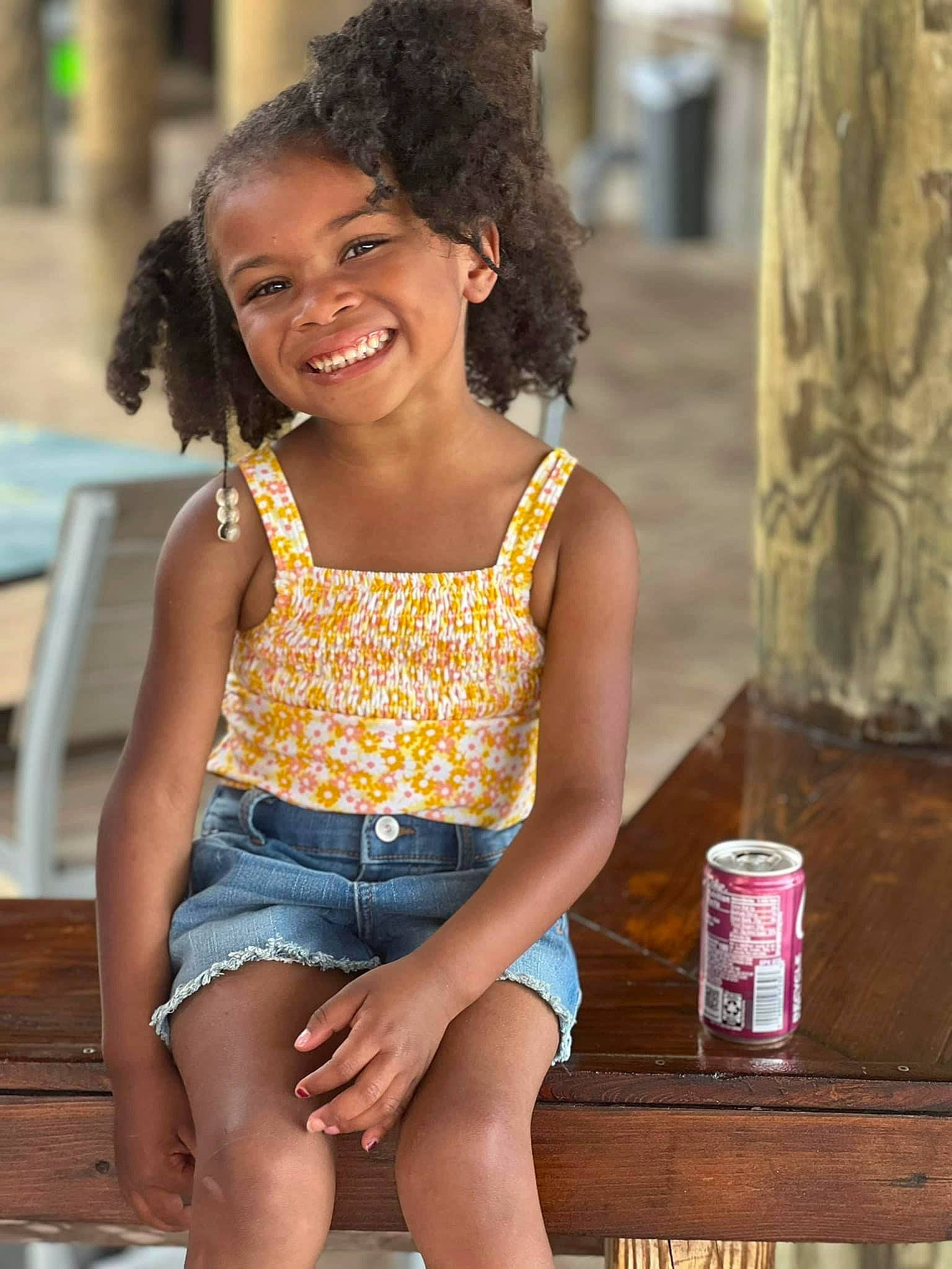 Braylee joined the competition — help win amazing prizes! abdomen, aluminum_can, beverage_can, black_hair, brown_hair, child, fun, happy, human_leg, jean_short, joy, leisure, long_hair, person, shorts, sitting, smile, thigh, tin, tin_can