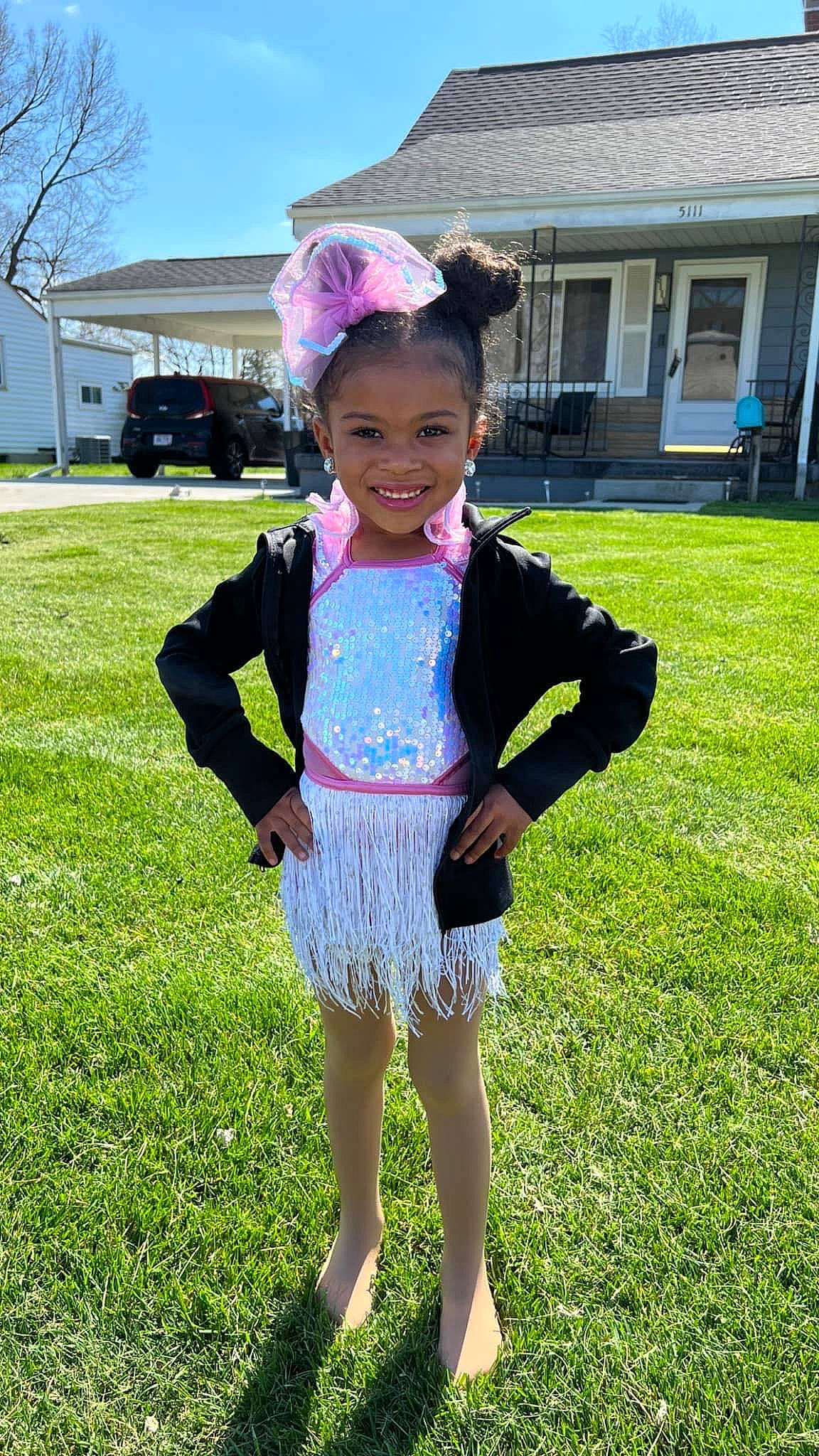 Braylee joined the competition — help win amazing prizes! barefoot, electric_blue, fun, grass, grassland, happy, human_leg, joy, leg, leisure, meadow, people_in_nature, person, personal_protective_equipment, pink, recreation, sky, smile, sportswear, tire