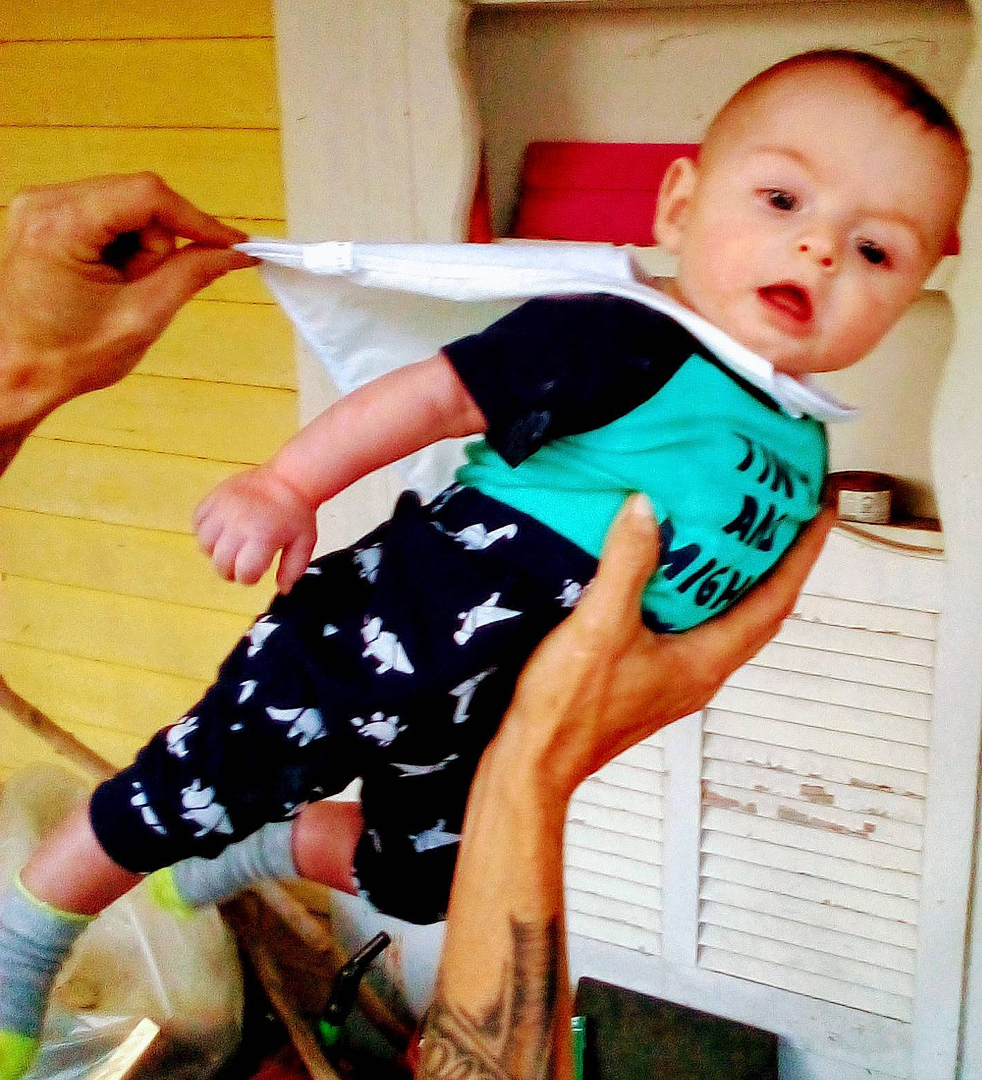 Isaiah joined the competition — help win amazing prizes! baby, baby_products, baby_toddler_clothing, barefoot, chair, child, comfort, foot, happy, human_leg, knee, pattern, person, play, room, sitting, sleeve, sock, t_shirt, thigh