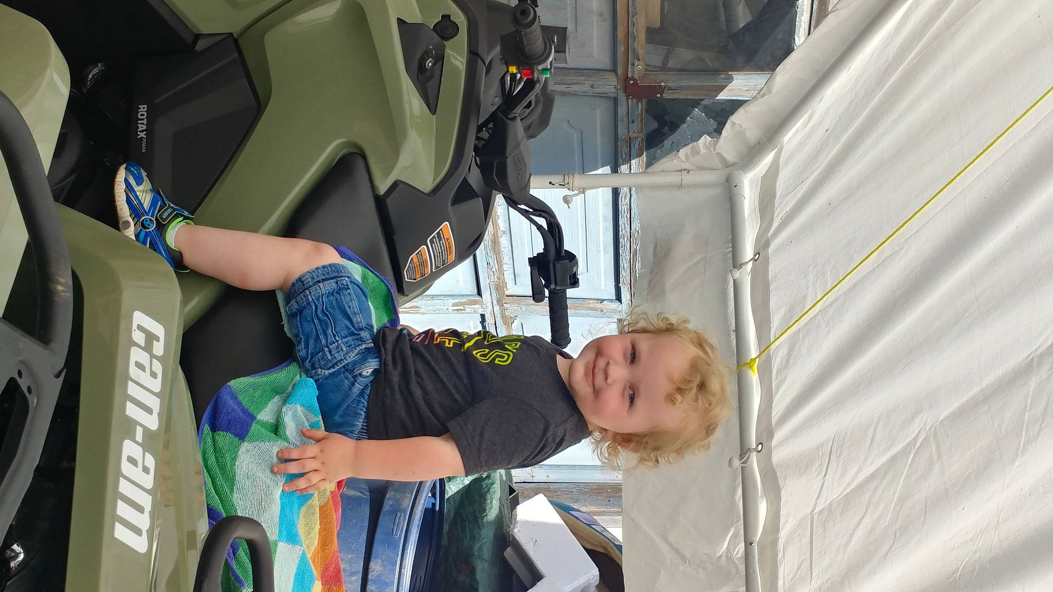 Maverick joined the competition — help win amazing prizes! auto_part, automotive_design, automotive_exterior, child, engineering, fun, hat, joy, leisure, machine, motor_vehicle, person, t_shirt, tire, toddler, transport, tree, vehicle_door