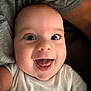 baby, smiling, face, closeup, infant, happy, child, person, white_clothing, skin, eyes, mouth, tongue, head, indoors, cute, expression, human, portrait, baby_face