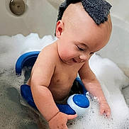 Elliott joined the competition — help win amazing prizes! baby, bath, bubbles, water, towel, child, cute, splashing, skin, hand, foam, tub, playful, infant, happy, young_child, bathroom, toy, sitting, head