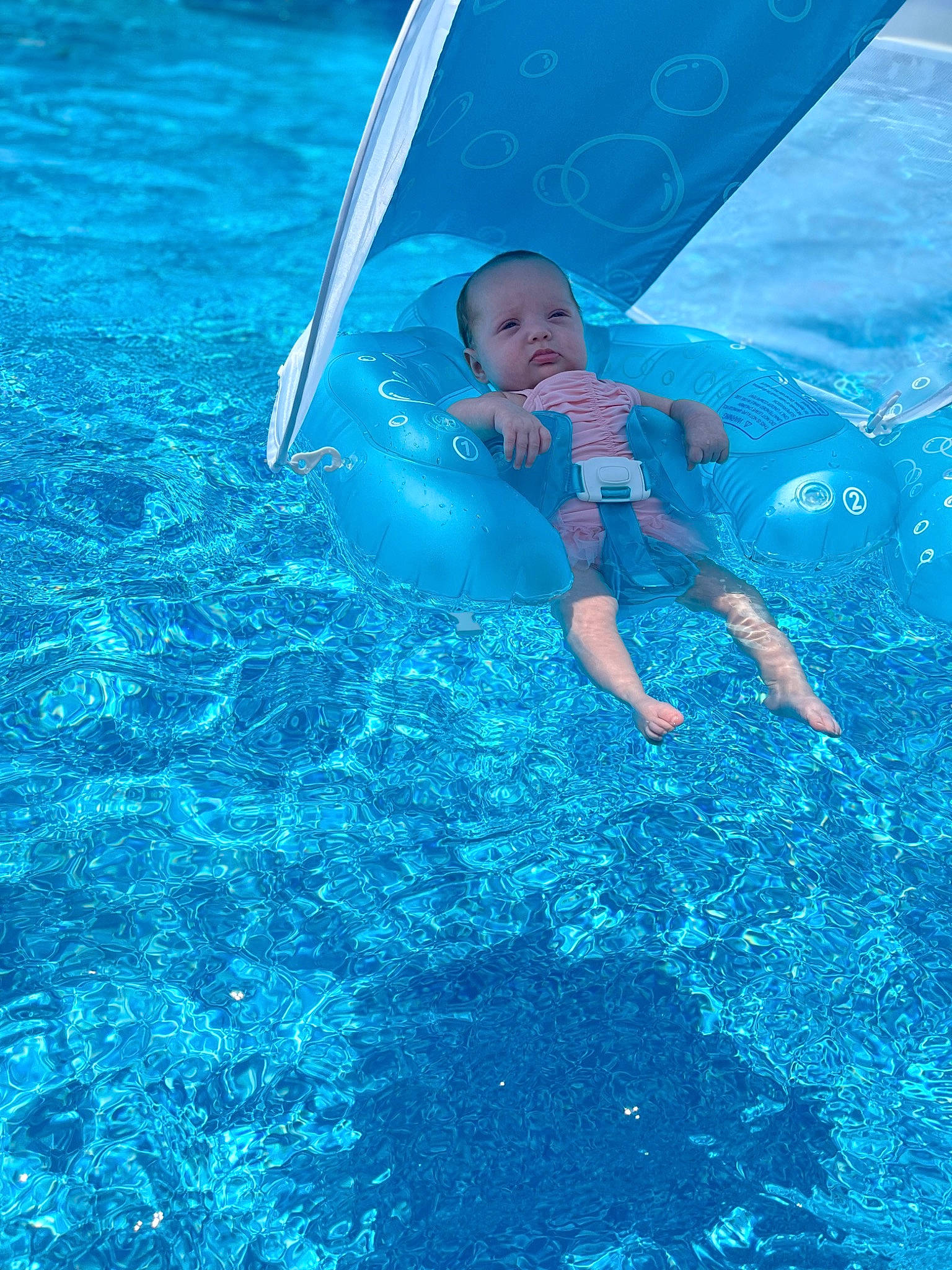 Ember joined the competition — help win amazing prizes! aqua, azure, baby, blue, child, electric_blue, fun, grass, happy, lake, leisure, ocean, people_in_nature, person, play, recreation, toddler, underwater, water, wave