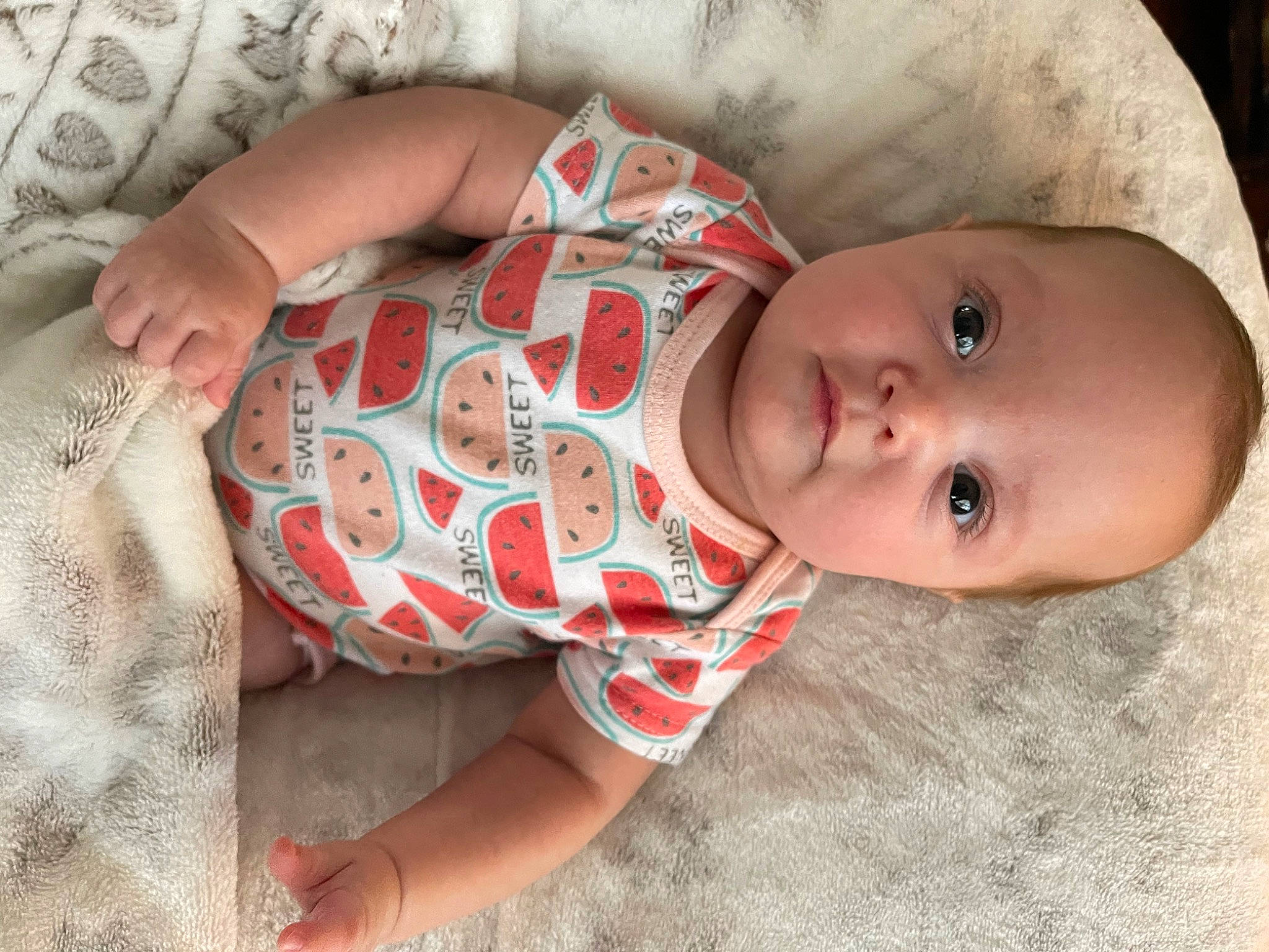 Ember joined the competition — help win amazing prizes! baby, baby_products, baby_toddler_clothing, cheek, chest, child, comfort, eye, facial_expression, hand, human_body, linens, lip, mouth, nose, pattern, person, skin, sleeve, toddler