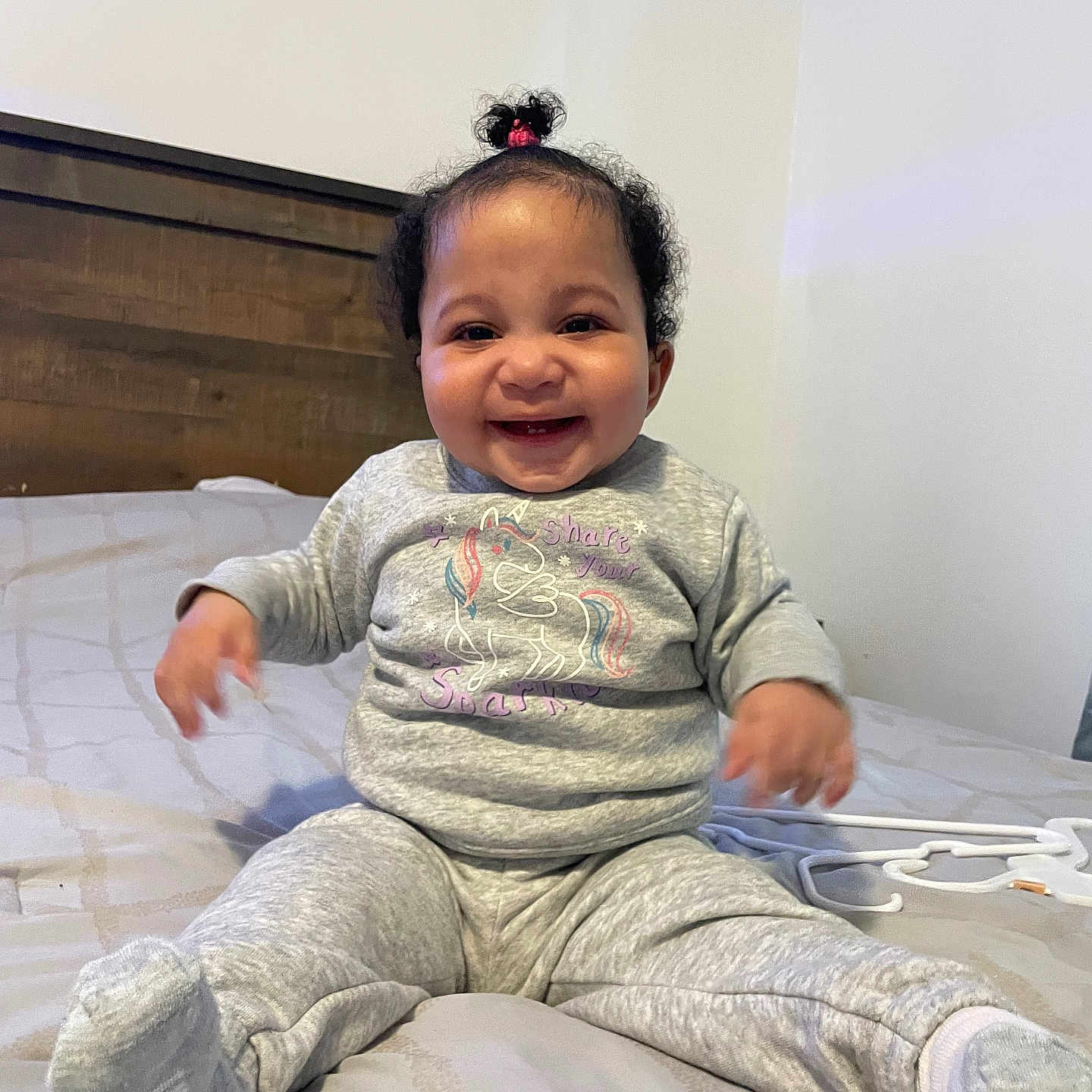 Jalaiya joined the competition — help win amazing prizes! baby, bed, child, clothing, cozy, cute, furniture, hair_tie, happy, headboard, indoor, infant, pajamas, person, portrait, room, sitting, smiling, unicorn, young_child