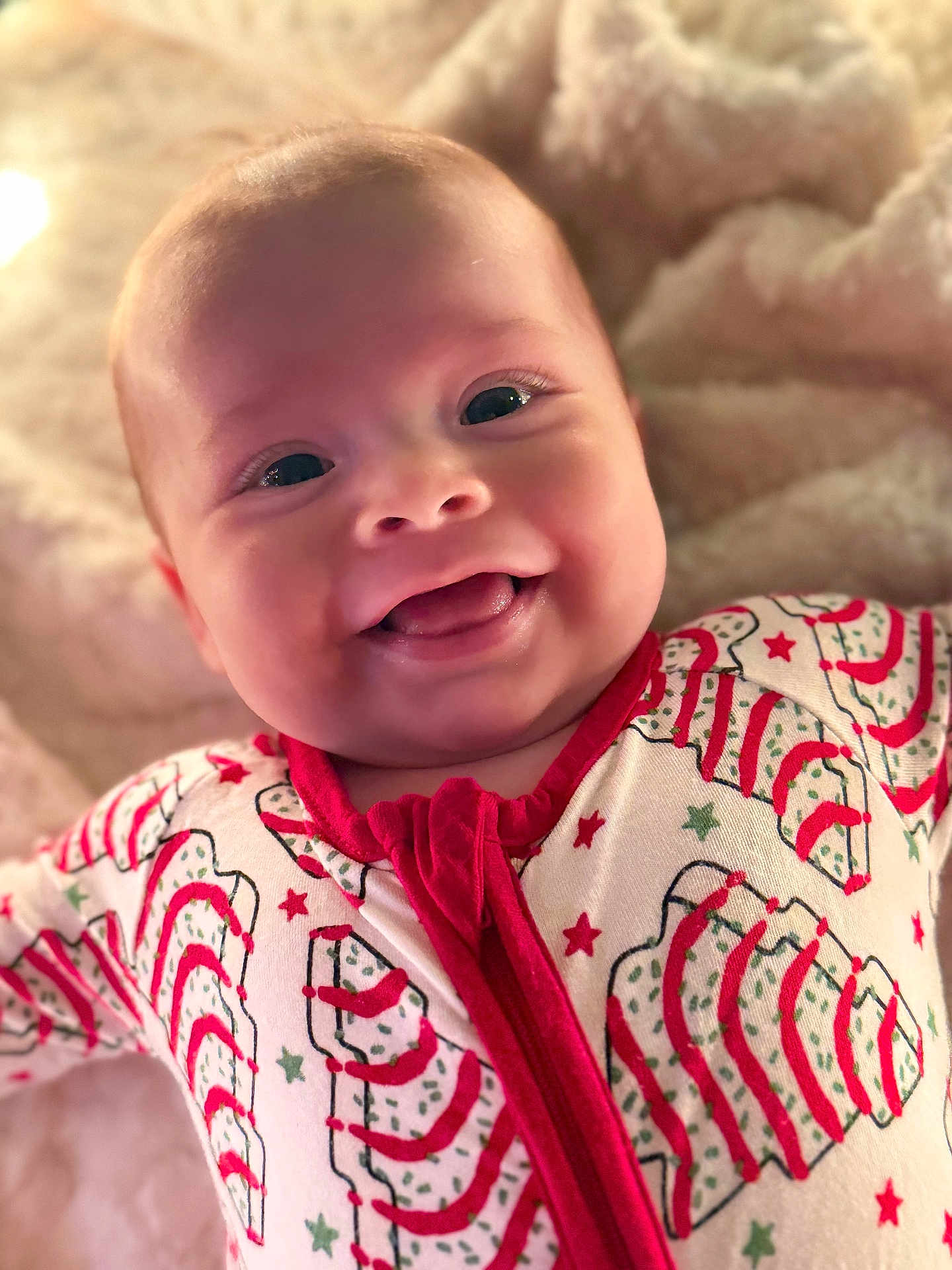 Heidi is registered to the contest to win money with this photo: baby, smiling, infant, pajamas, face, cute, child, soft, blanket, happy, cozy, portrait, indoors, closeup, young, skin, head, expression, warm, comfort