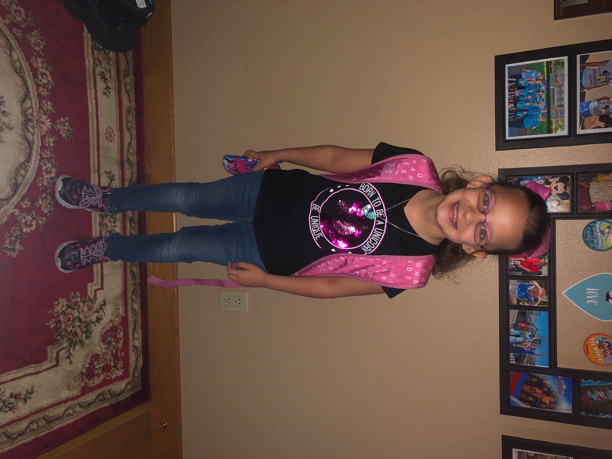 Kaitlyn joined the competition — help win amazing prizes! clothing, dress, flooring, fun, happy, human_leg, joy, knee, magenta, person, picture_frame, pink, purple, room, shelf, smile, sportswear, standing, t_shirt, textile