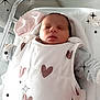 Oria a rejoint le concours — aidez-le/la à gagner de superbes lots ! newborn, baby, infant, sleeping, bassinet, crib, hospital, blanket, heart_pattern, sparkles, pacifier, mittens, sleep_sack, portrait, soft_lighting, peaceful, cute, clothing, card_label, nursery