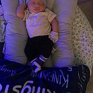 Kingston joined the competition — help win amazing prizes! baby, sleeping, hat, mittens, baby_lounger, blanket, patterned_blanket, cozy, indoor, infant, resting, clothing, soft_lighting, cushion, bedroom, comfort, person, sleepwear, peaceful, newborn