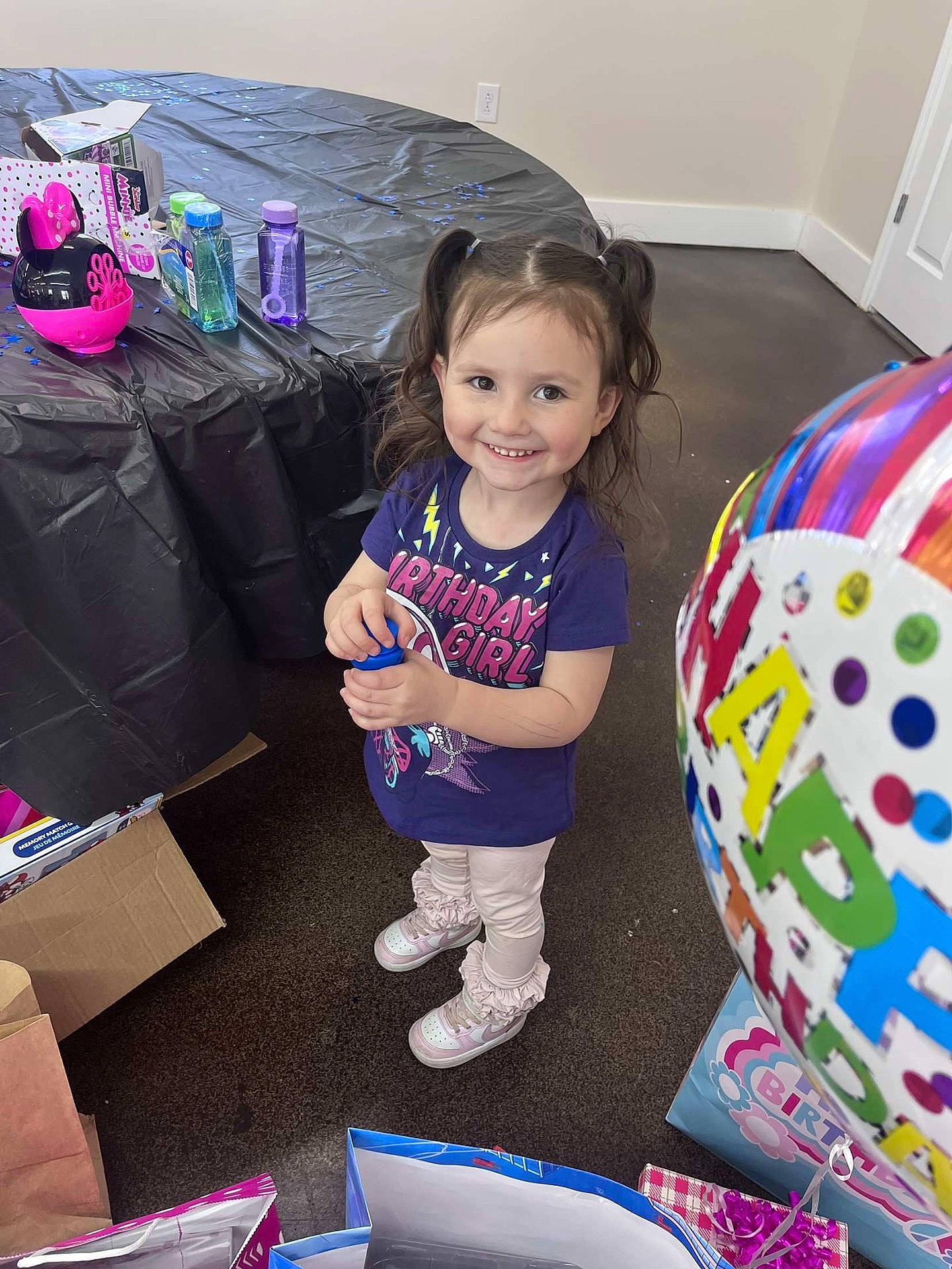 accessories, bag, beanbag, child, clothing, face, female, footwear, furniture, girl, handbag, head, helmet, person, photography, portrait, shoe, sitting, sleeve, t_shirt