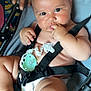 baby, infant, stroller, diaper, hand, pacifier, straps, cute, chubby, skin, person, child, sitting, indoors, comfort, expression, babywearing, closeup, face, fingers