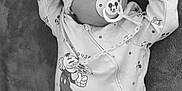 Antoine participe au concours pour gagner de l'argent avec cette photo : baby, sleeping, pacifier, mickey_mouse, onesie, hat, blanket, toy, infant, child, cute, peaceful, clothing, soft, lying_down, indoor, monochrome, face, hand, foot