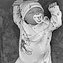 baby, sleeping, pacifier, mickey_mouse, onesie, hat, blanket, toy, infant, child, cute, peaceful, clothing, soft, lying_down, indoor, monochrome, face, hand, foot