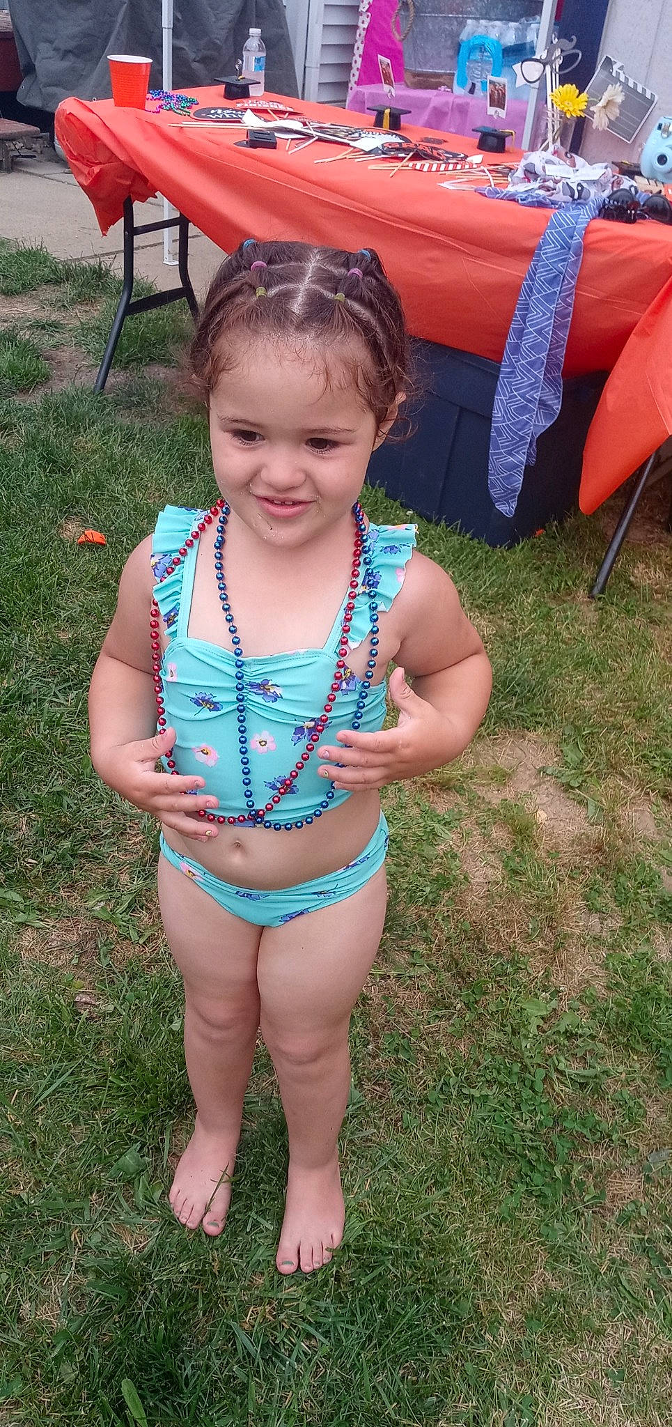 Sophia joined the competition — help win amazing prizes! baby, baby_toddler_clothing, chair, chest, face, fun, grass, hair, happy, head, joy, leisure, person, photograph, pink, recreation, skin, smile, summer, swimwear