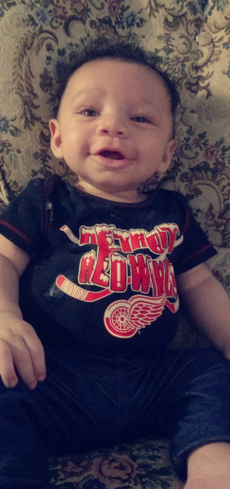 Matteo is registered to the contest to win money with this photo: baby_toddler_clothing, cheek, chin, eye, eyebrow, face, flash_photography, forehead, hair, happy, head, lip, mouth, neck, nose, organ, person, skin, sleeve, smile