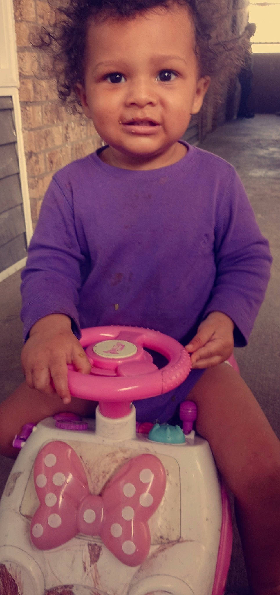 Aviana is registered to the contest to win money with this photo: automotive_wheel_system, beauty, child, circle, finger, fun, hand, happy, light, machine, magenta, mouth, nail, organ, person, pink, purple, sitting, skin, t_shirt