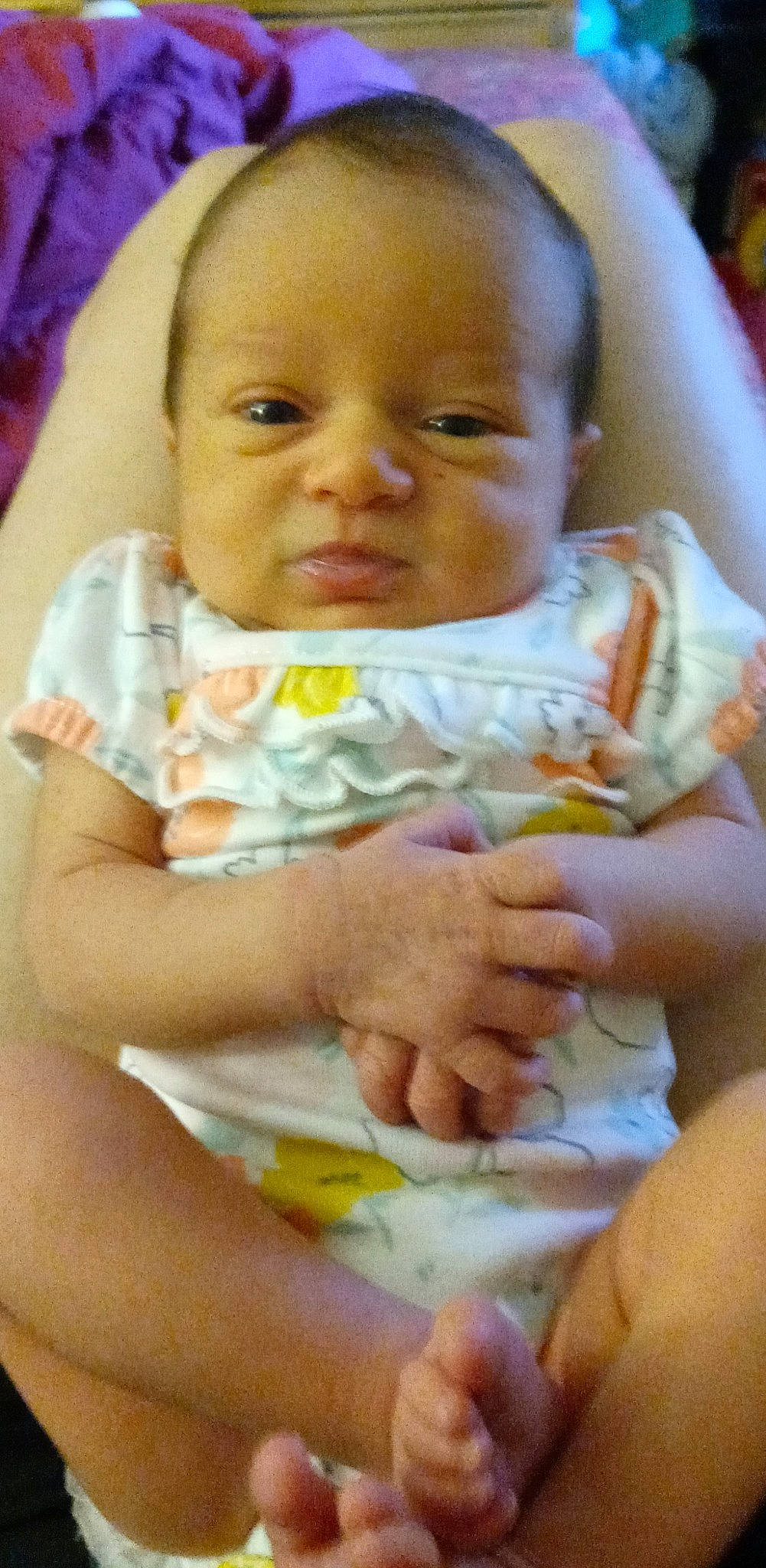 Mavis is registered to the contest to win money with this photo: baby, baby_toddler_clothing, cheek, child, comfort, facial_expression, finger, gesture, glasses, happy, human_body, iris, lip, mouth, nose, person, skin, thumb, toddler, white