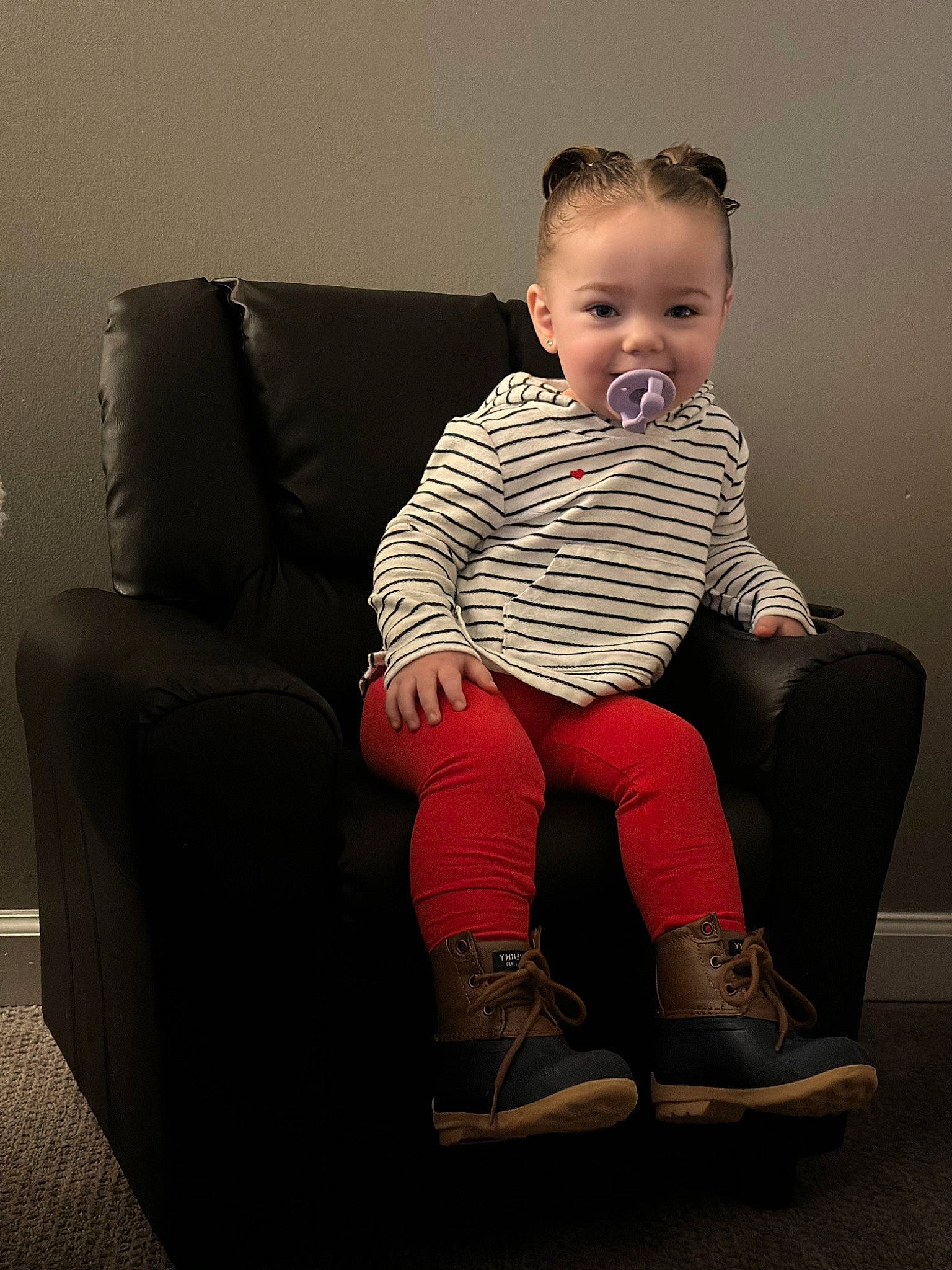 Sophia is registered to the contest to win money with this photo: arm, baby_toddler_clothing, cheek, comfort, flash_photography, head, human_body, human_leg, joint, joy, knee, lap, leg, neck, person, shoulder, sitting, skin, sleeve, sock