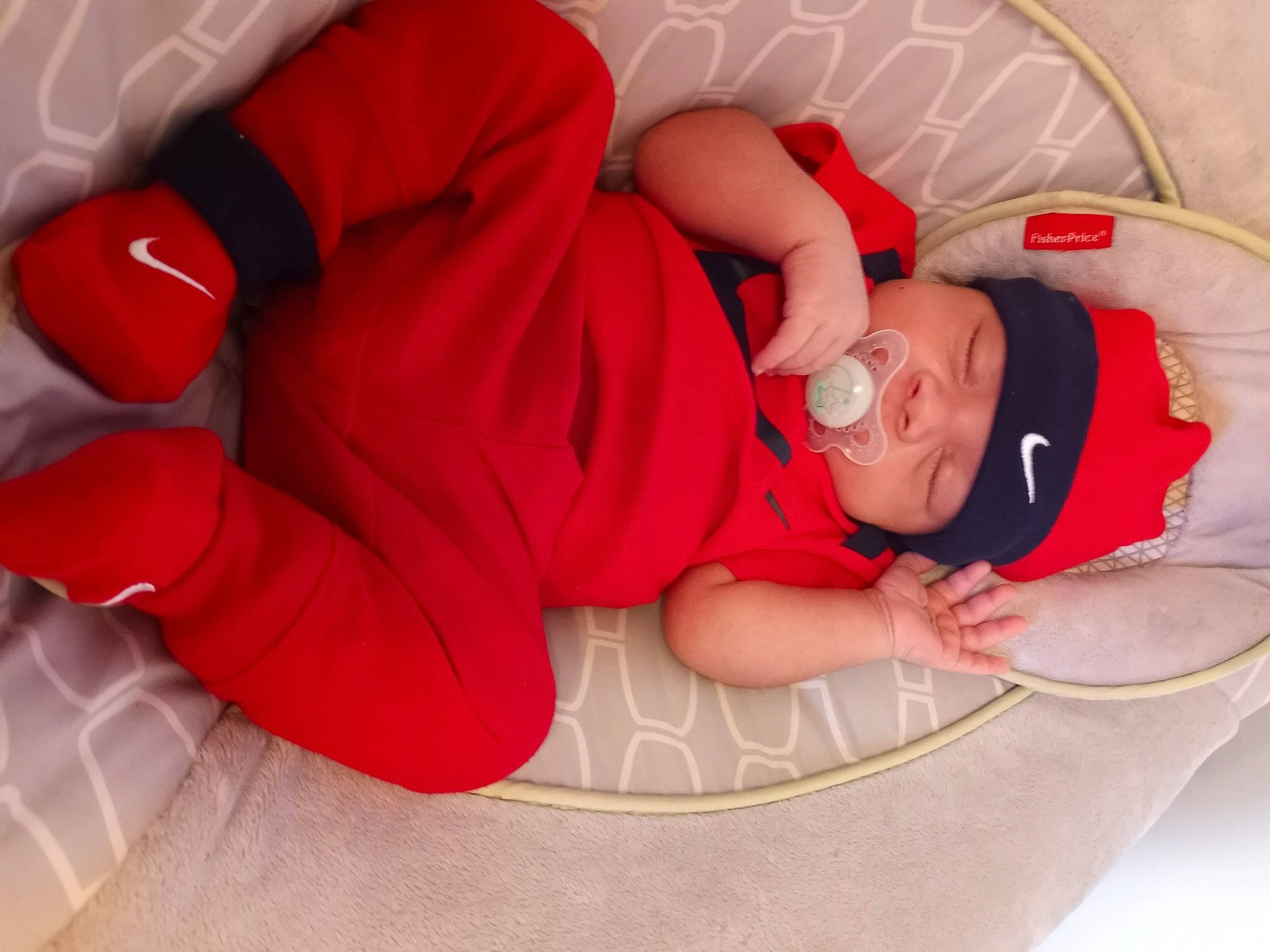 Damien joined the competition — help win amazing prizes! arm, baby, baby_sleeping, comfort, elbow, eye, finger, glasses, hand, headwear, human_body, joint, knee, leg, mouth, person, pink, skin, sleeve, stomach