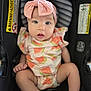 baby, infant, child, car_seat, headband, pink_bow, watermelon_pattern, clothing, face, eyes, legs, fingers, cute, expression, indoor, seatbelt, safety, portrait, person, young