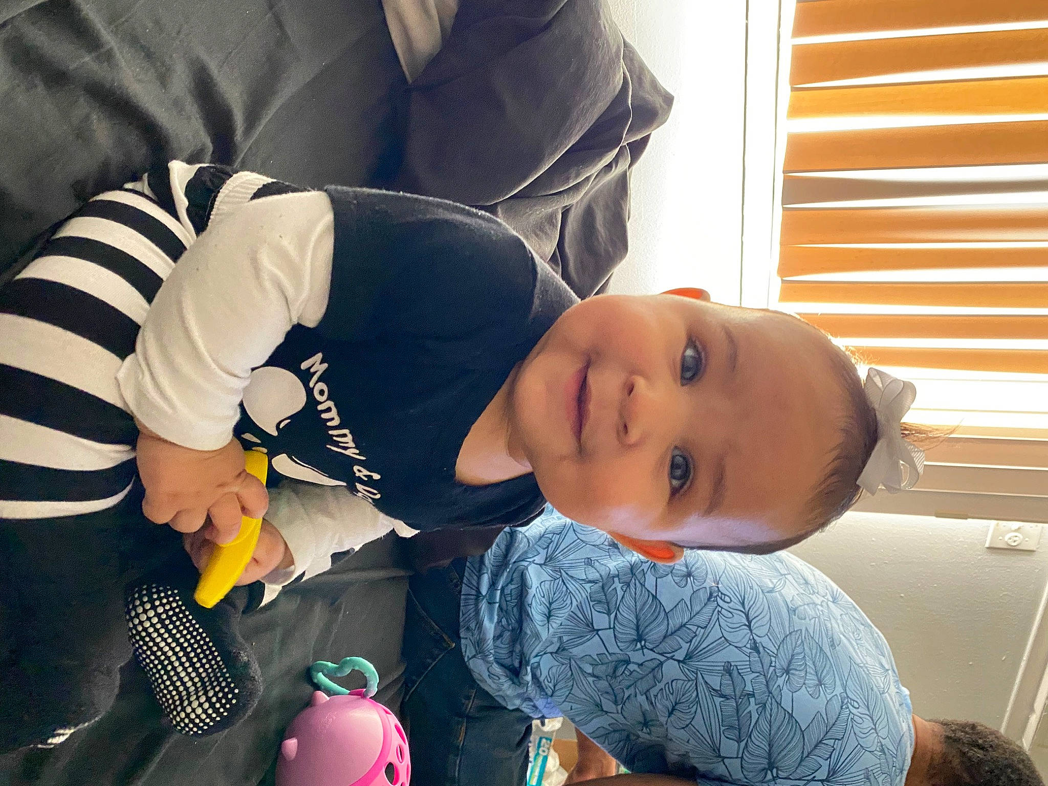 Ivy joined the competition — help win amazing prizes! baby, baby_products, baby_toddler_clothing, black_hair, child, comfort, flooring, fun, happy, joy, mouth, person, play, room, sitting, smile, toddler, window, window_blind