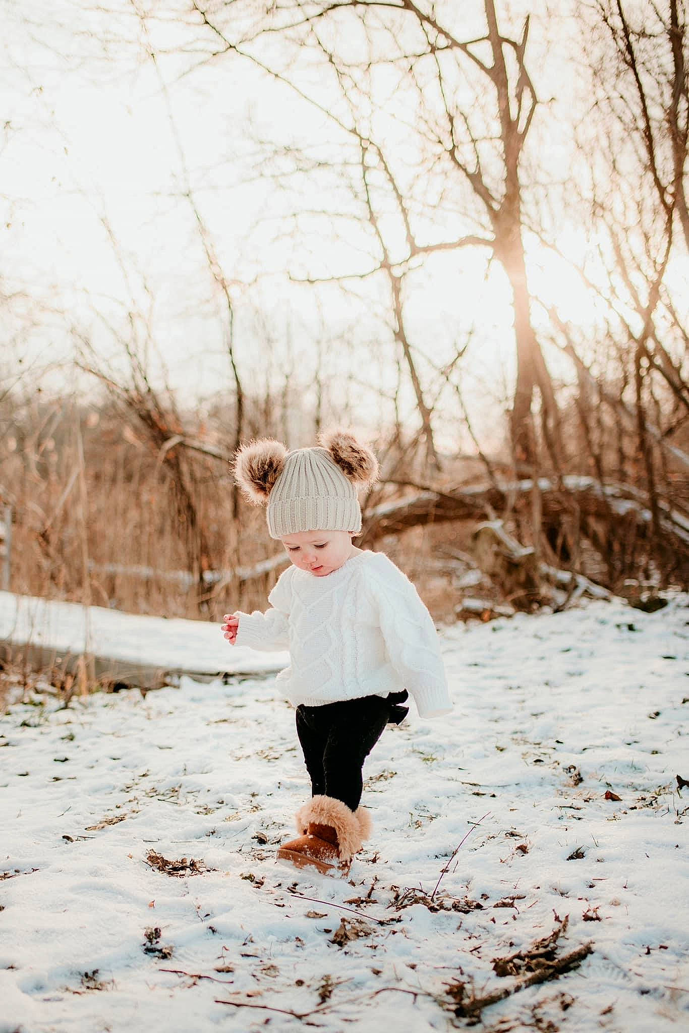Analeia is registered to the contest to win money with this photo: flash_photography, forest, freezing, gesture, grass, hairstyle, happy, headwear, human_leg, knee, long_hair, outerwear, people_in_nature, person, plant, snow, tree, trunk, twig, waist