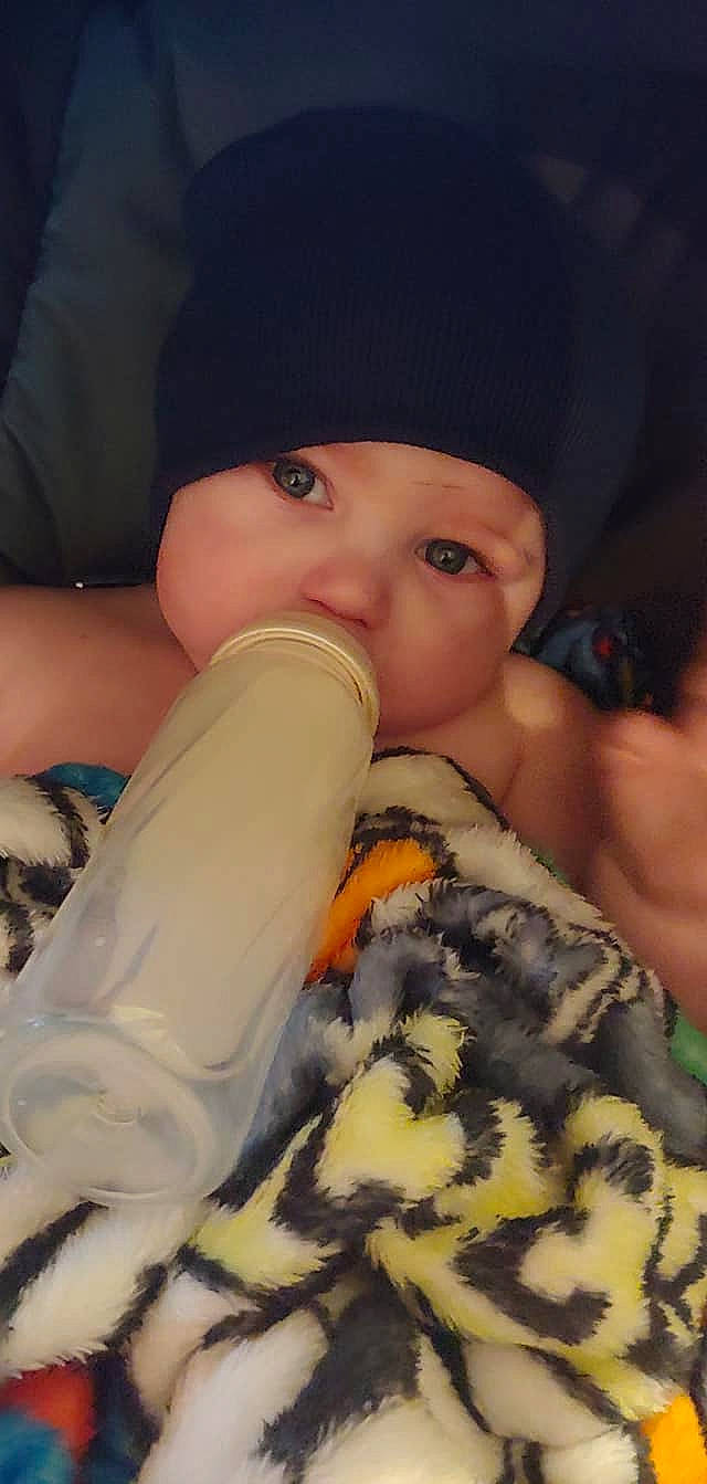 Hayden is registered to the contest to win money with this photo: baby, baby_bottle, baby_products, cheek, child, drinkware, eye, finger, hand, nail, nose, person, product, skin, toddler