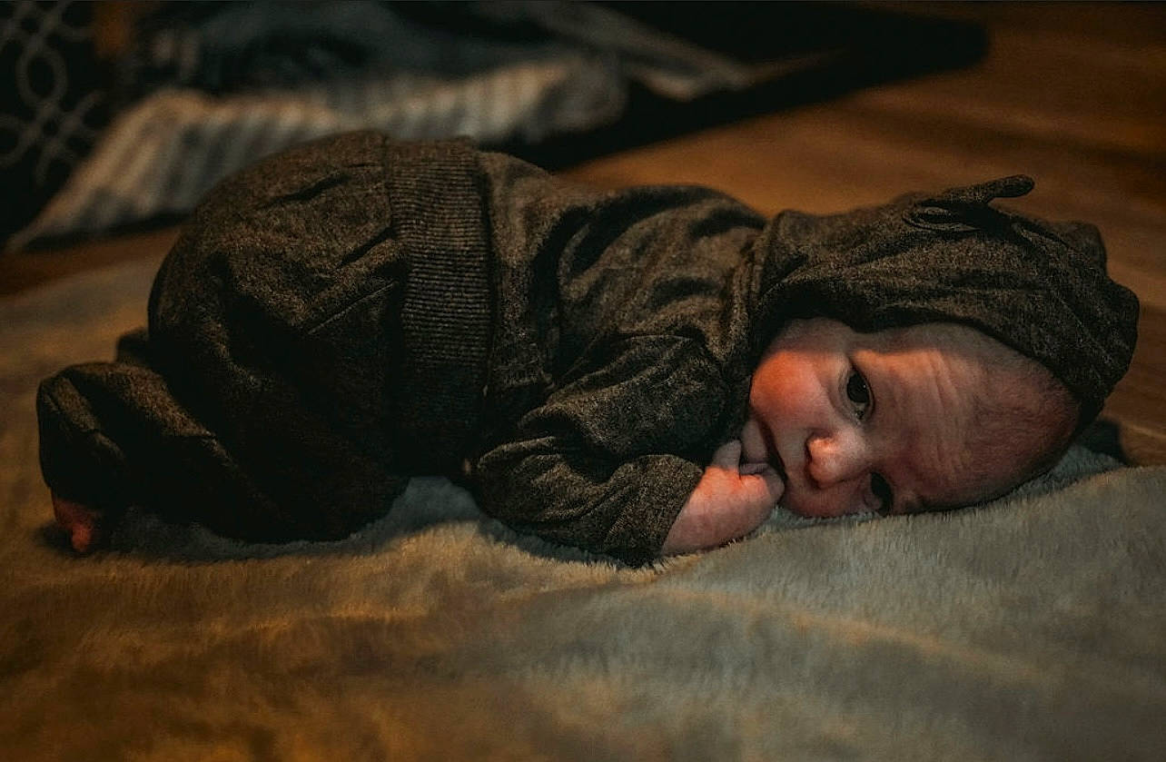 Coleson joined the competition — help win amazing prizes! carpet, child, comfort, crawling, darkness, flash_photography, flooring, fun, fur, grass, grey, headgear, landscape, person, portrait_photography, shadow, sitting, smile, soil, toddler