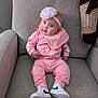 Harper joined the competition — help win amazing prizes! baby, child, pink_clothing, nike, sneakers, headband, bib, armchair, gray_furniture, indoor, portrait, cute, blue_eyes, infant, seated, soft_lighting, cozy, casual, young_child, happy