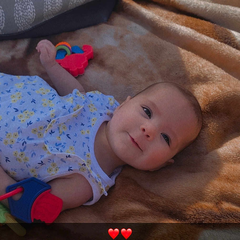 Isabella joined the competition — help win amazing prizes! baby, bed, blanket, bodypart, clothing, couch, cushion, face, finger, furniture, glove, hand, hat, head, homedecor, newborn, person, photography, portrait, quilt