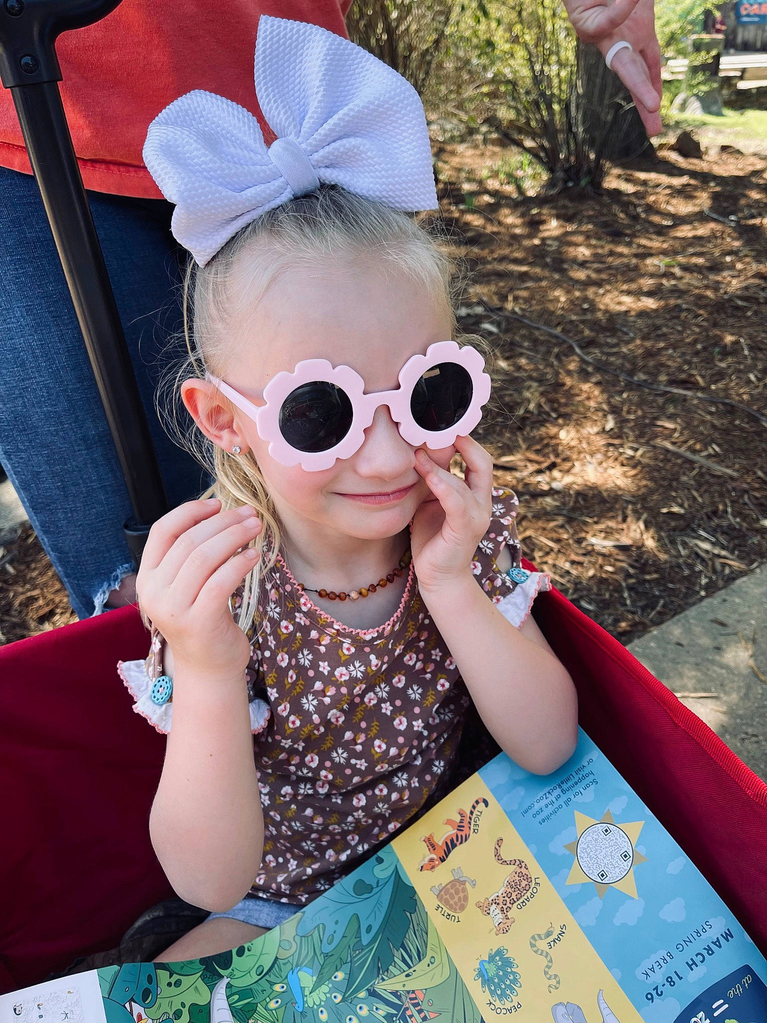 Kinsley joined the competition — help win amazing prizes! cap, cool, eyewear, fun, glasses, goggles, grass, green, happy, joy, leisure, lip, magenta, person, personal_protective_equipment, pink, smile, summer, sunglasses, textile