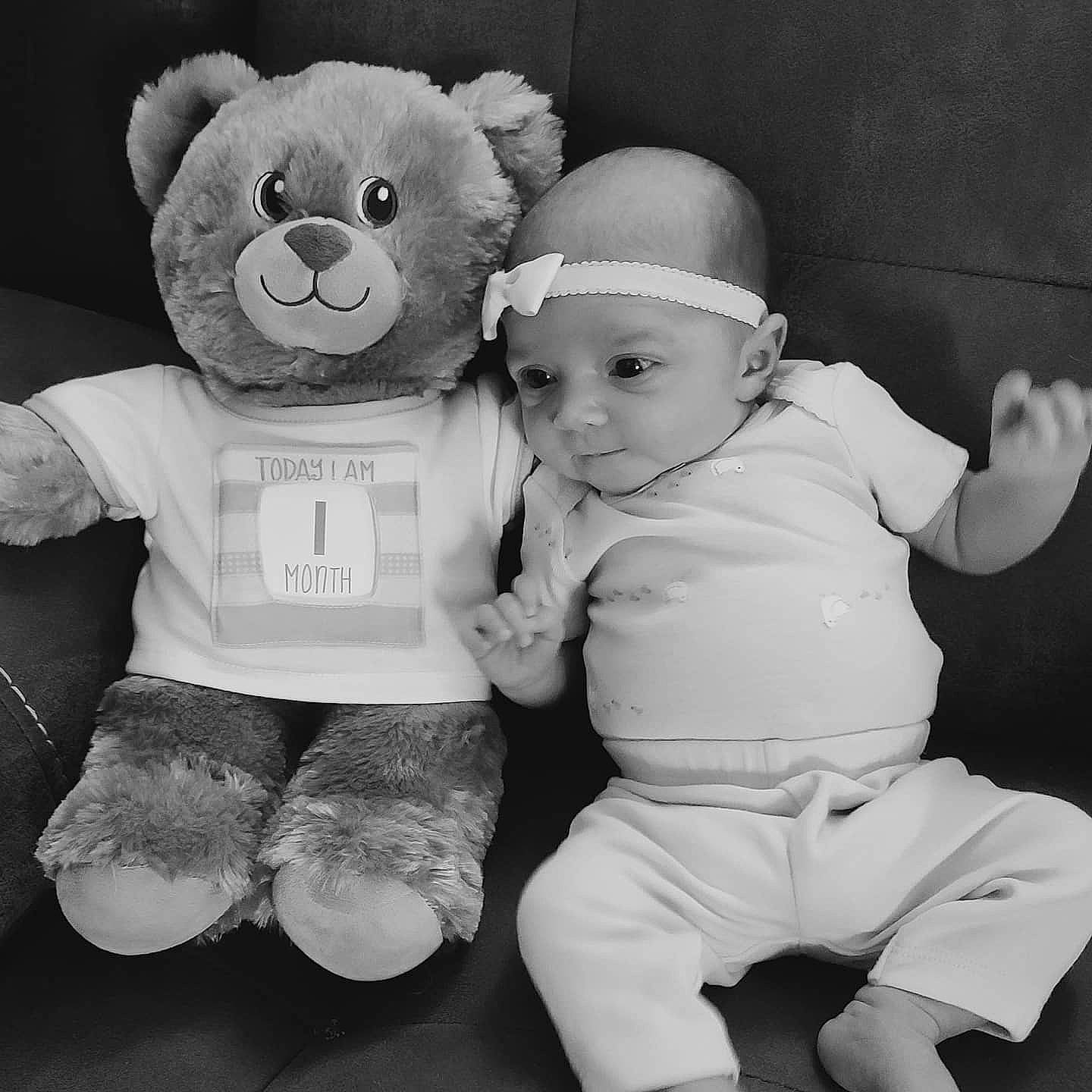 Aubriella joined the competition — help win amazing prizes! black, black_and_white, eye, gesture, happy, headwear, human_body, interaction, mammal, monochrome, monochrome_photography, organ, person, skin, sleeve, standing, style, teddy_bear, textile, toy