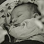 Milo a rejoint le concours — aidez-le/la à gagner de superbes lots ! baby, sleeping, blanket, heart_pattern, infant, soft_fabric, close_up, monochrome, portrait, peaceful, cozy, child, rest, cute, newborn, clothing, face, head, toddler, comfort