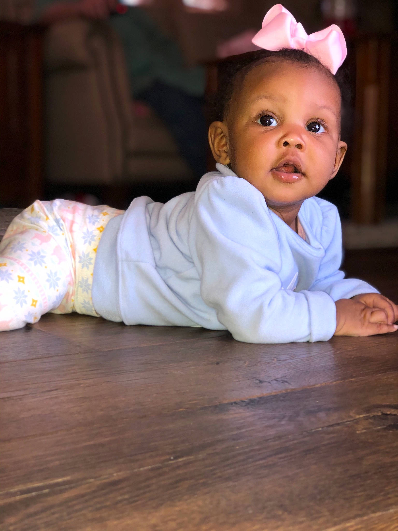 Adilynn joined the competition — help win amazing prizes! baby, beauty, cheek, child, crawling, dress, eye, floor, flooring, fun, hand, hardwood, head, person, pink, sitting, skin, smile, toddler, tummy_time