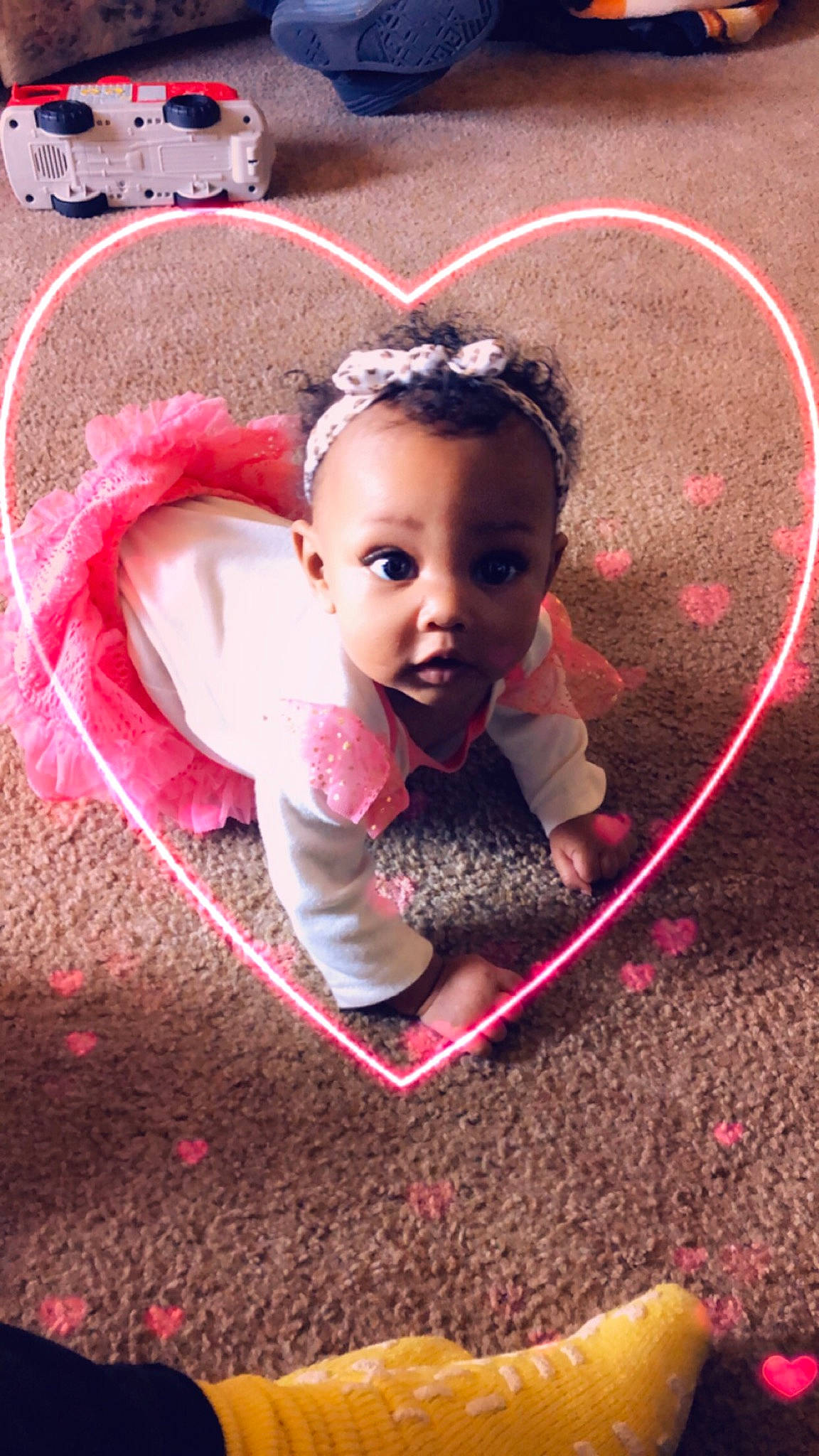 Adilynn is registered to the contest to win money with this photo: baby, child, fun, heart, person, pink, play, smile, surprise, toddler