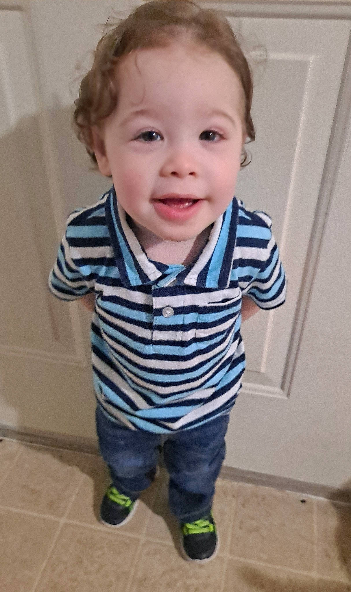 Gianni is registered to the contest to win money with this photo: active_pants, baby, baby_toddler_clothing, cheek, child, collar, electric_blue, face, flooring, fun, happy, pattern, person, sleeve, smile, t_shirt, toddler