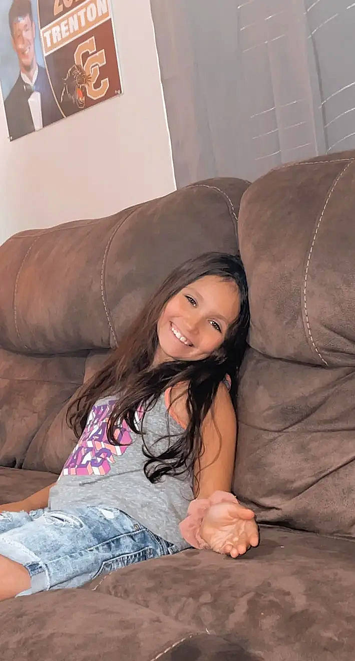 Dailee joined the competition — help win amazing prizes! black_hair, comfort, couch, facial_expression, finger, flash_photography, floor, flooring, fun, happy, joy, lip, living_room, long_hair, mouth, person, shoulder, skin, smile, textile