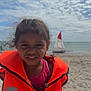 Zendaya participe au concours pour gagner de l'argent avec cette photo : beach, child, clouds, fun, girl, happy, life_jacket, ocean, outdoor, portrait, sailboat, sand, sky, smile, summer, sunlight, vacation, water, waves, wind