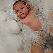 Grayson joined the competition — help win amazing prizes! baby, infant, bathtub, foam, bubbles, water, skin, child, relaxing, bath, wet, young, cute, face, head, arm, hand, leg, body, clean