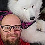 Brodie Lee Sims joined the competition — help win amazing prizes! man, dog, white_dog, glasses, beard, bald, indoor, closeup, pink_harness, pet, smile, affection, face, friendly, canine, adult, portrait, cozy, animal, companion