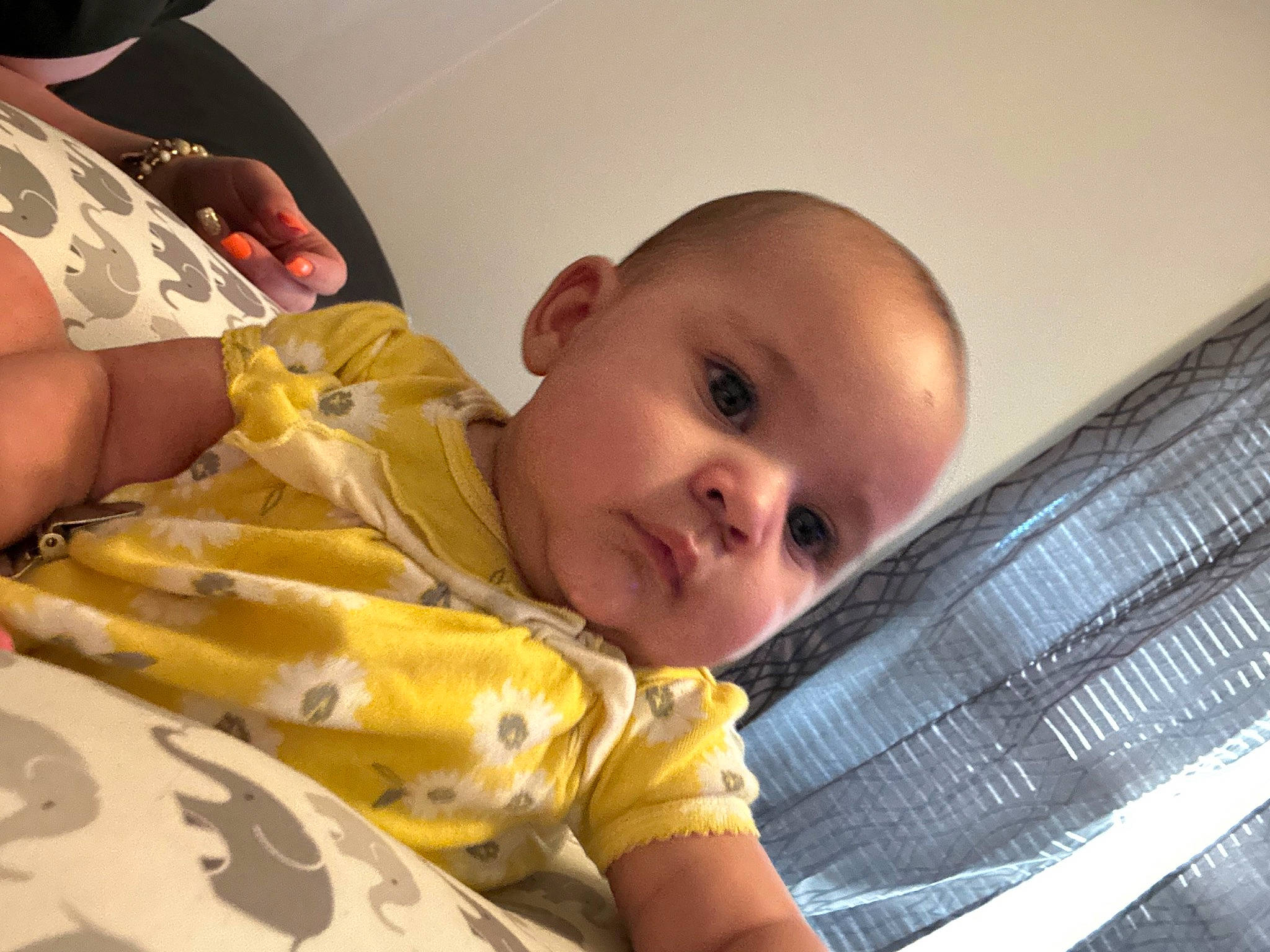 Marlee is registered to the contest to win money with this photo: baby, baby_products, baby_toddler_clothing, cheek, child, comfort, finger, fun, happy, hat, iris, linens, nail, person, room, sitting, skin, smile, sun_hat, thumb