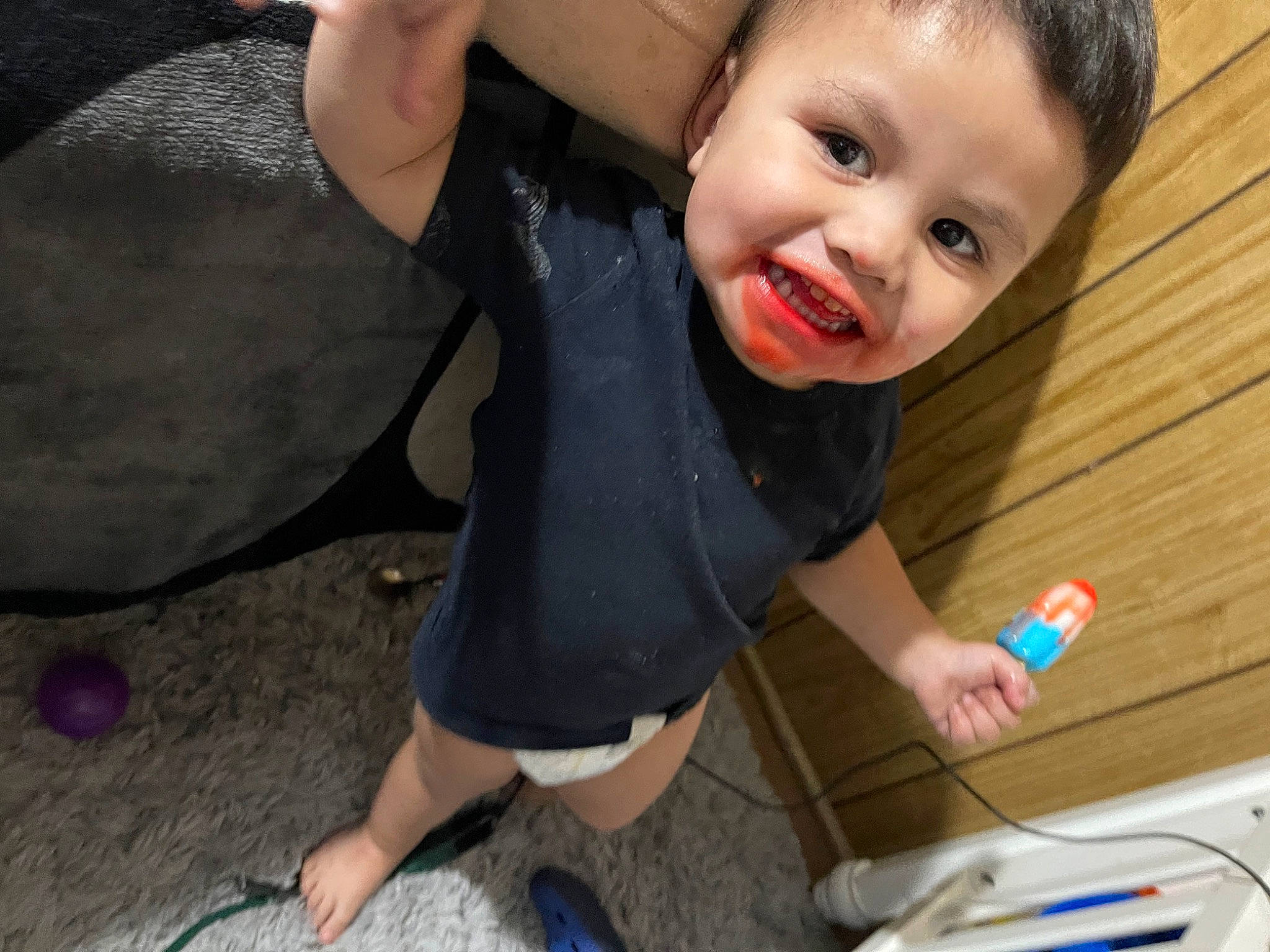 Carlos joined the competition — help win amazing prizes! baby_toddler_clothing, chair, child, flooring, foot, fun, gesture, happy, human_leg, joint, knee, office_supplies, pen, person, sandal, smile, t_shirt, thigh, thumb, toddler